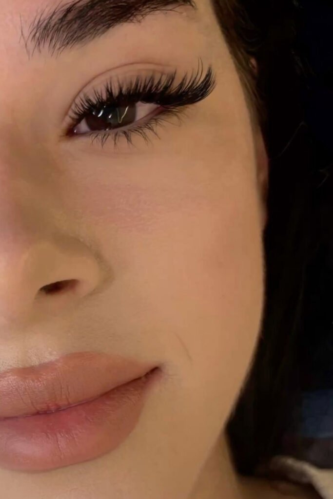Soft, wispy eyelash extensions with a natural makeup look