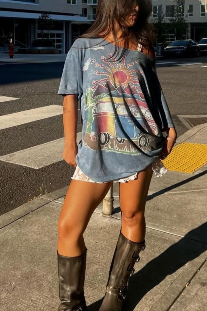 Oversized vintage graphic tee styled with boots