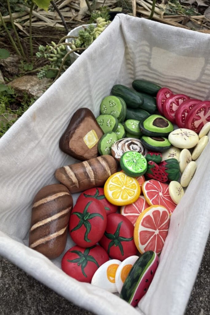 Crate of play food for a mud kitchen