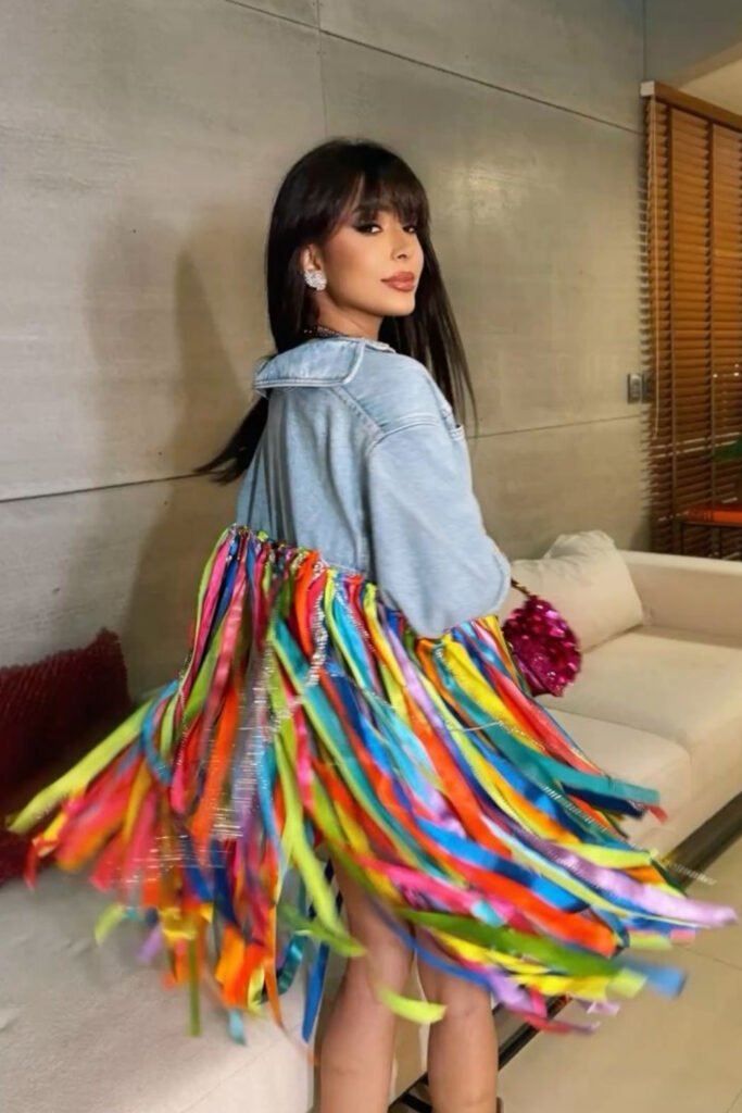 Jacket with long rainbow ribbon fringe for a bold Pride look