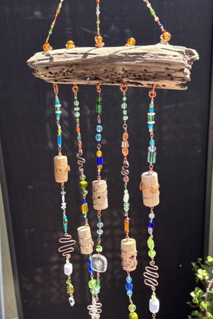 Driftwood wind chime with wine corks, wooden beads and metal spirals