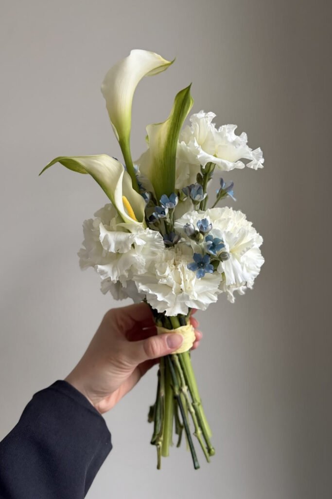 White calla lilies with blue and white hydrangea