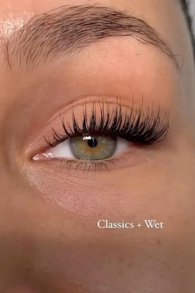 Close-up of a classic wet-look eyelash extension set